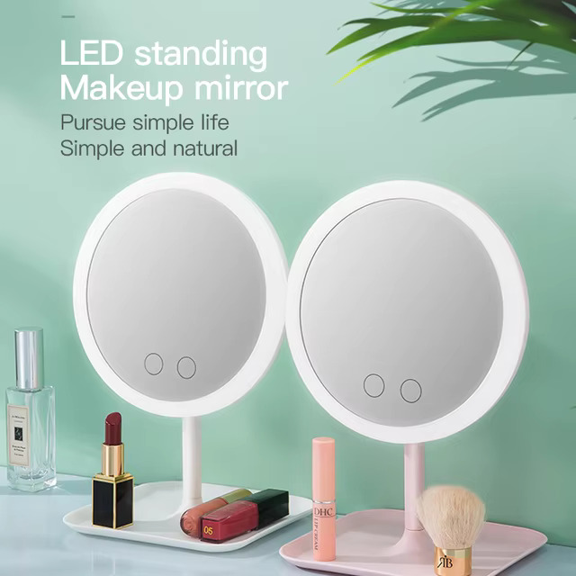 Rechargeable LED makeup mirror with lights, featuring a compact design and adjustable brightness for a flawless makeup application anywhere.