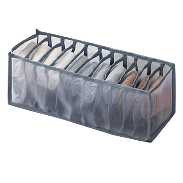 Clothes organiser with multiple compartments for neatly storing underwear, socks, bras, and scarves in drawers.