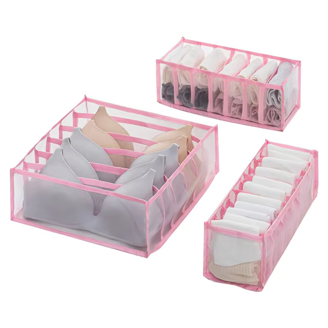 Clothes organiser with multiple compartments for neatly storing underwear, socks, bras, and scarves in drawers.