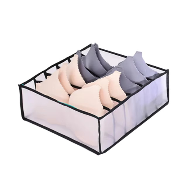 Clothes organiser with multiple compartments for neatly storing underwear, socks, bras, and scarves in drawers.