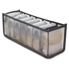 Clothes organiser with multiple compartments for neatly storing underwear, socks, bras, and scarves in drawers.