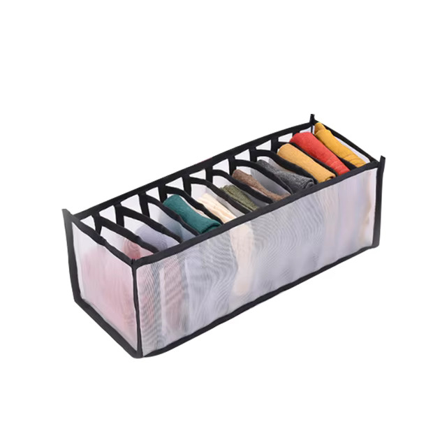 Clothes organiser with multiple compartments for neatly storing underwear, socks, bras, and scarves in drawers.