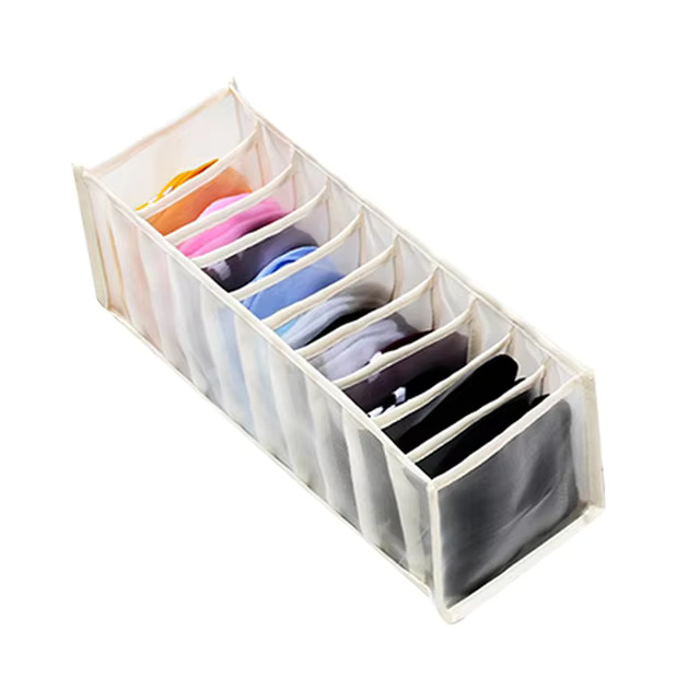 Clothes organiser with multiple compartments for neatly storing underwear, socks, bras, and scarves in drawers.